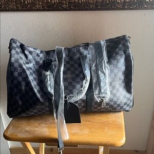 Checkered Black and Gray Duffel Bag